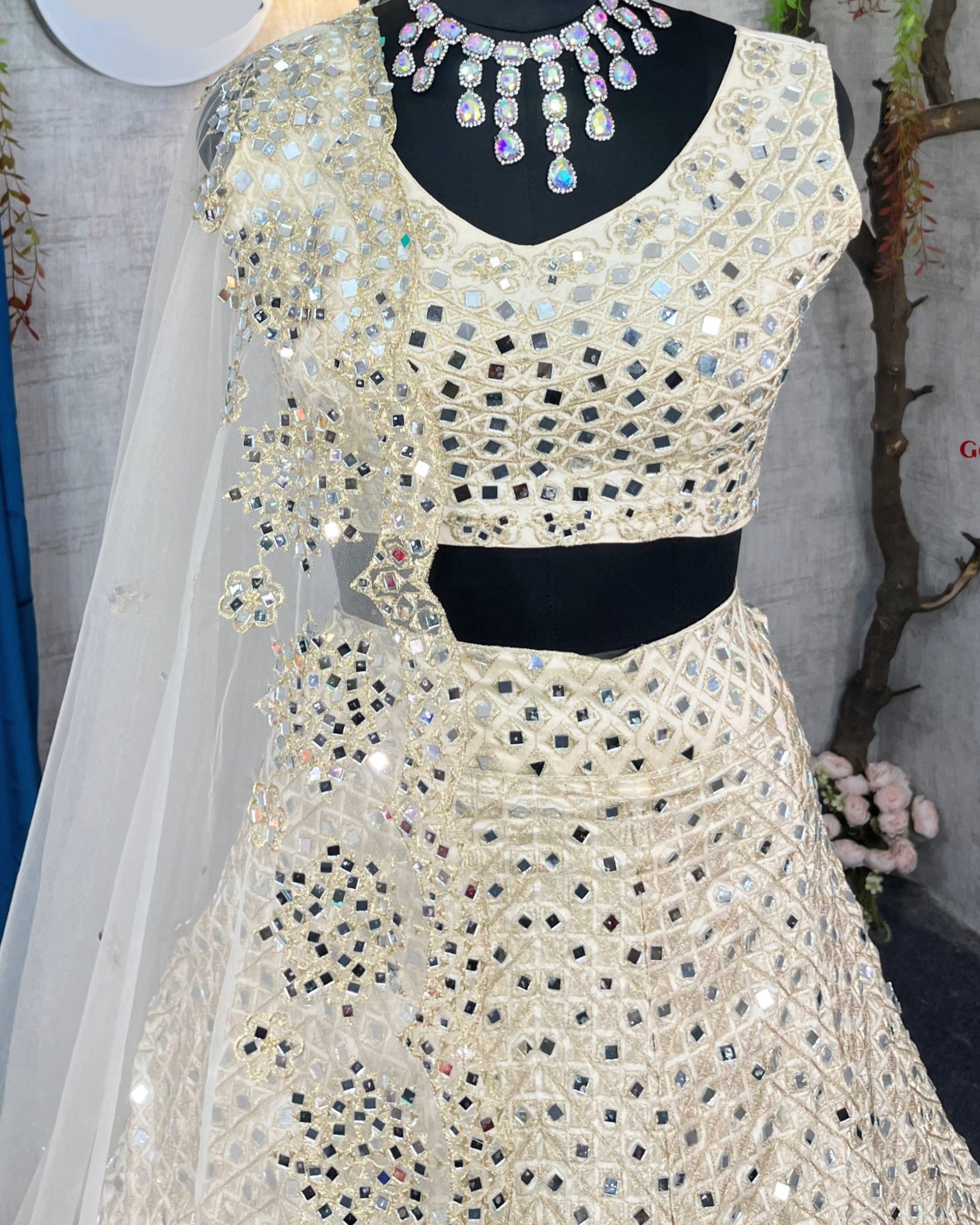 White colour lehenga with mirror work and attarctive lahenga with blouse