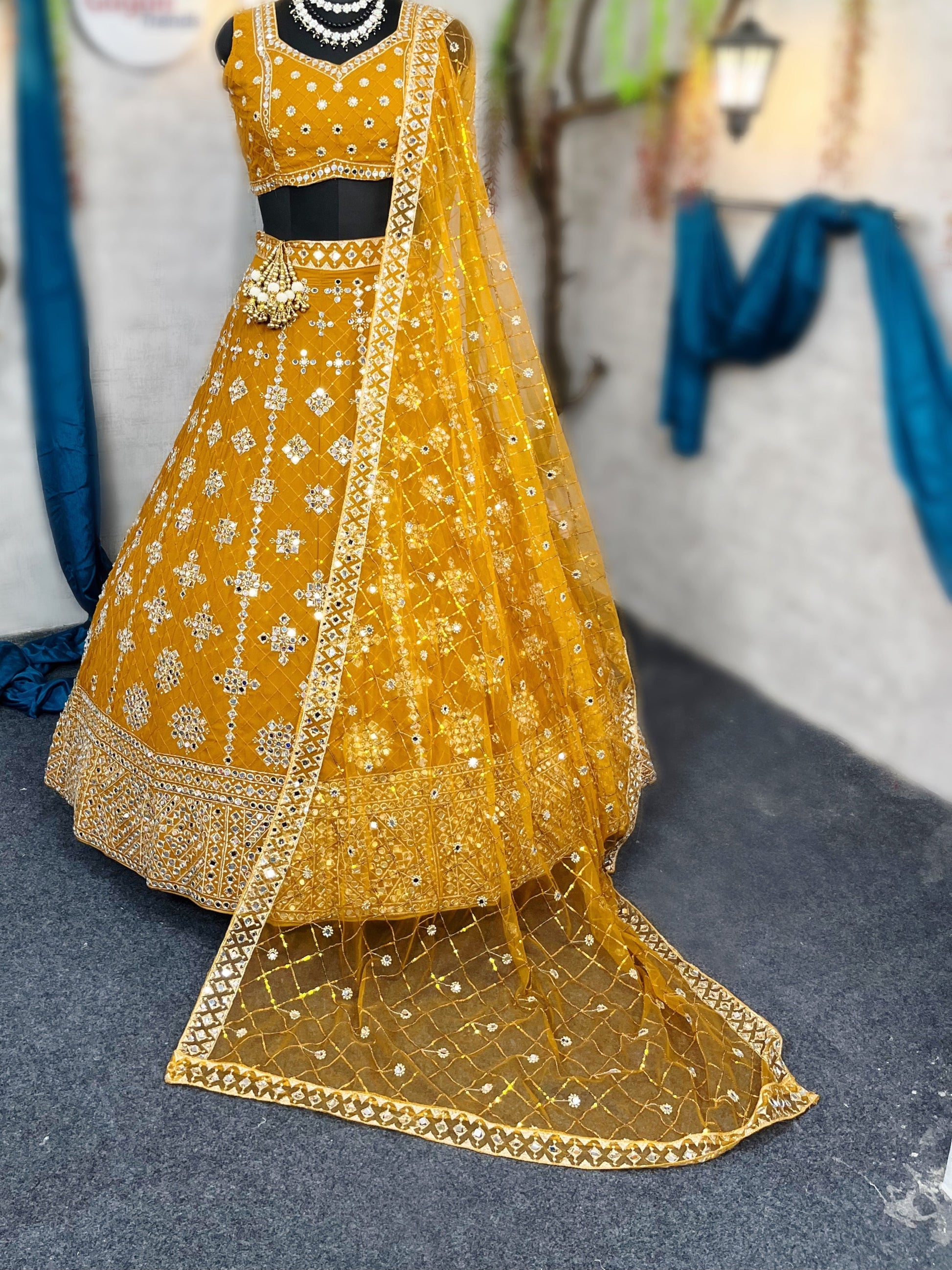 Yellow colour mirror Work with Can-Can and designer blouse Festive look lehenga