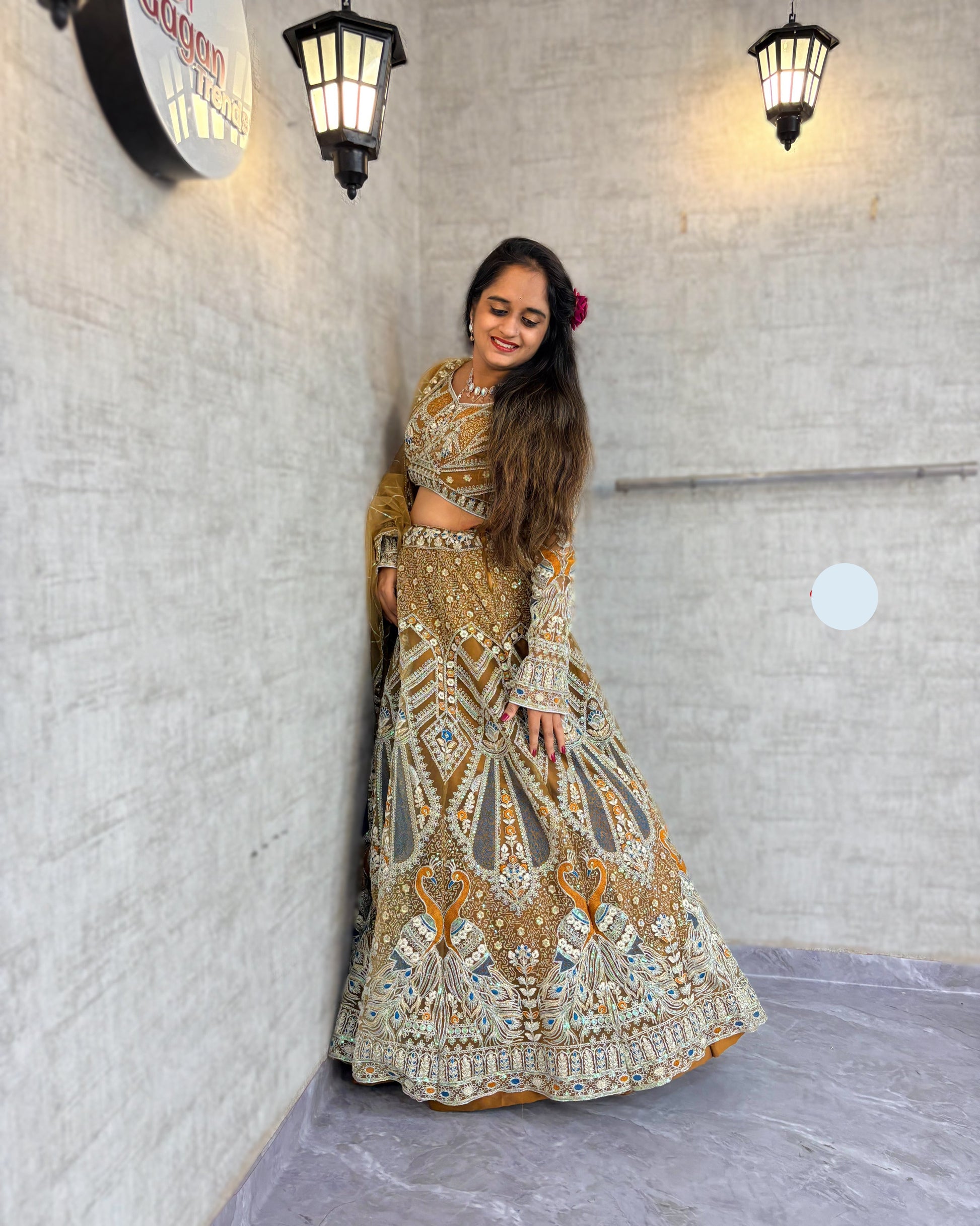 Goldish colour Soft Net Lehenga Choli with Coding Sequins Work