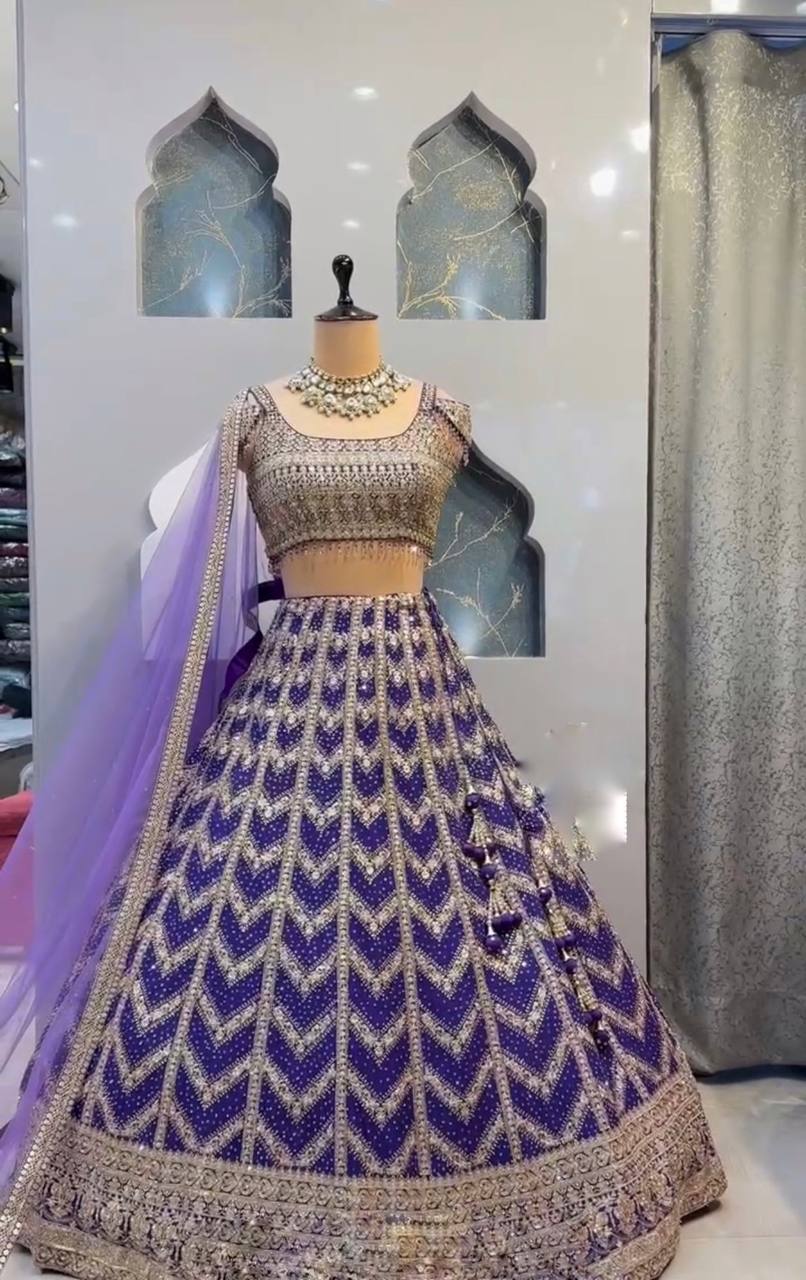 royal blue lehenga with heavy golden zari and sequin embroidery