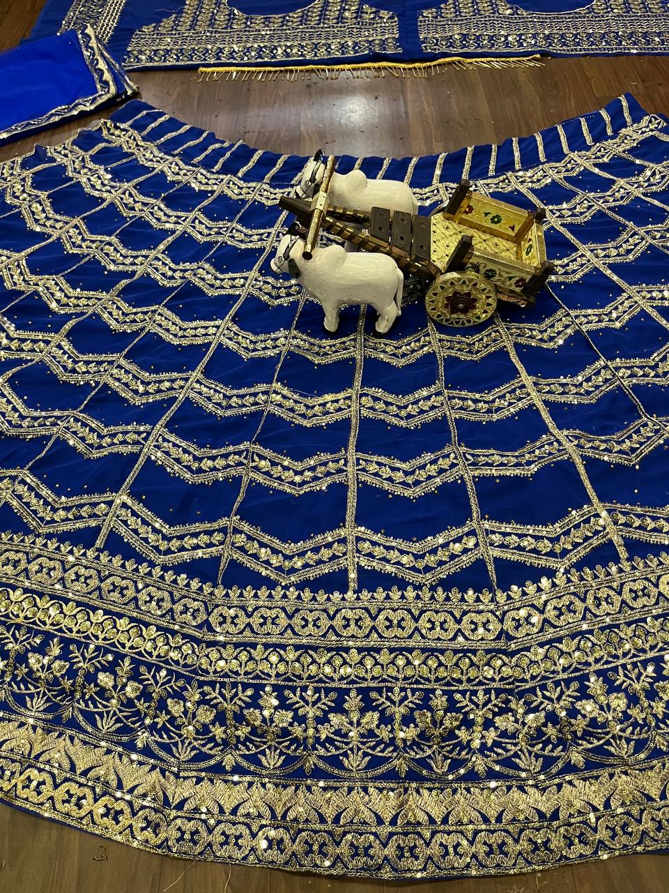 royal blue lehenga with heavy golden zari and sequin embroidery