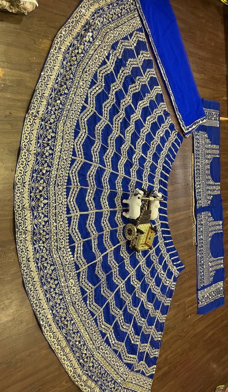 royal blue lehenga with heavy golden zari and sequin embroidery