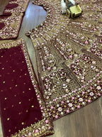 Maroon Soft Net Lehenga Choli with Intricate Sequins & Thread Embroidery