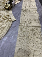 Cream Silk Embroidered Lehenga Set with Golden Zari and Sequin Work