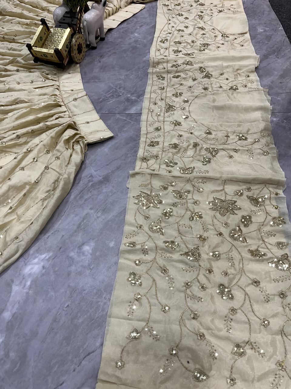 Cream Silk Embroidered Lehenga Set with Golden Zari and Sequin Work