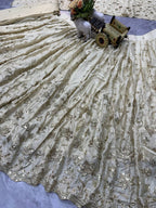 Cream Silk Embroidered Lehenga Set with Golden Zari and Sequin Work