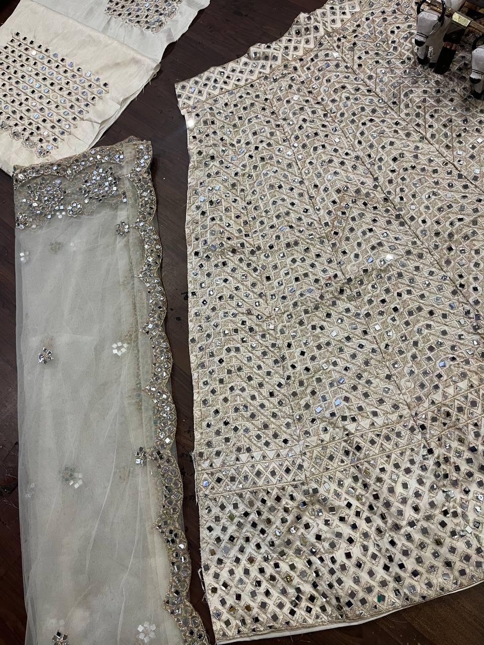 White colour lehenga with mirror work and attarctive lahenga with blouse