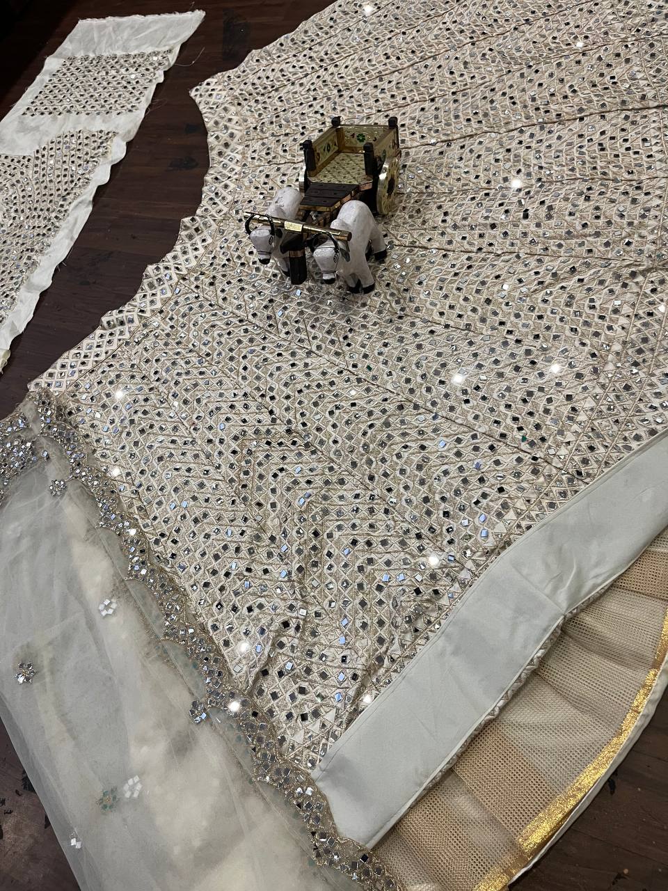 White colour lehenga with mirror work and attarctive lahenga with blouse