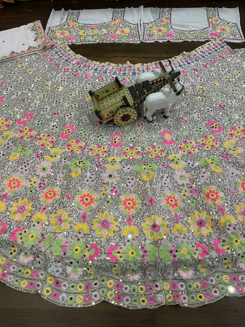 Multi colour Luxurious Faux Georgette lehenga with Mirror and  designer blouse