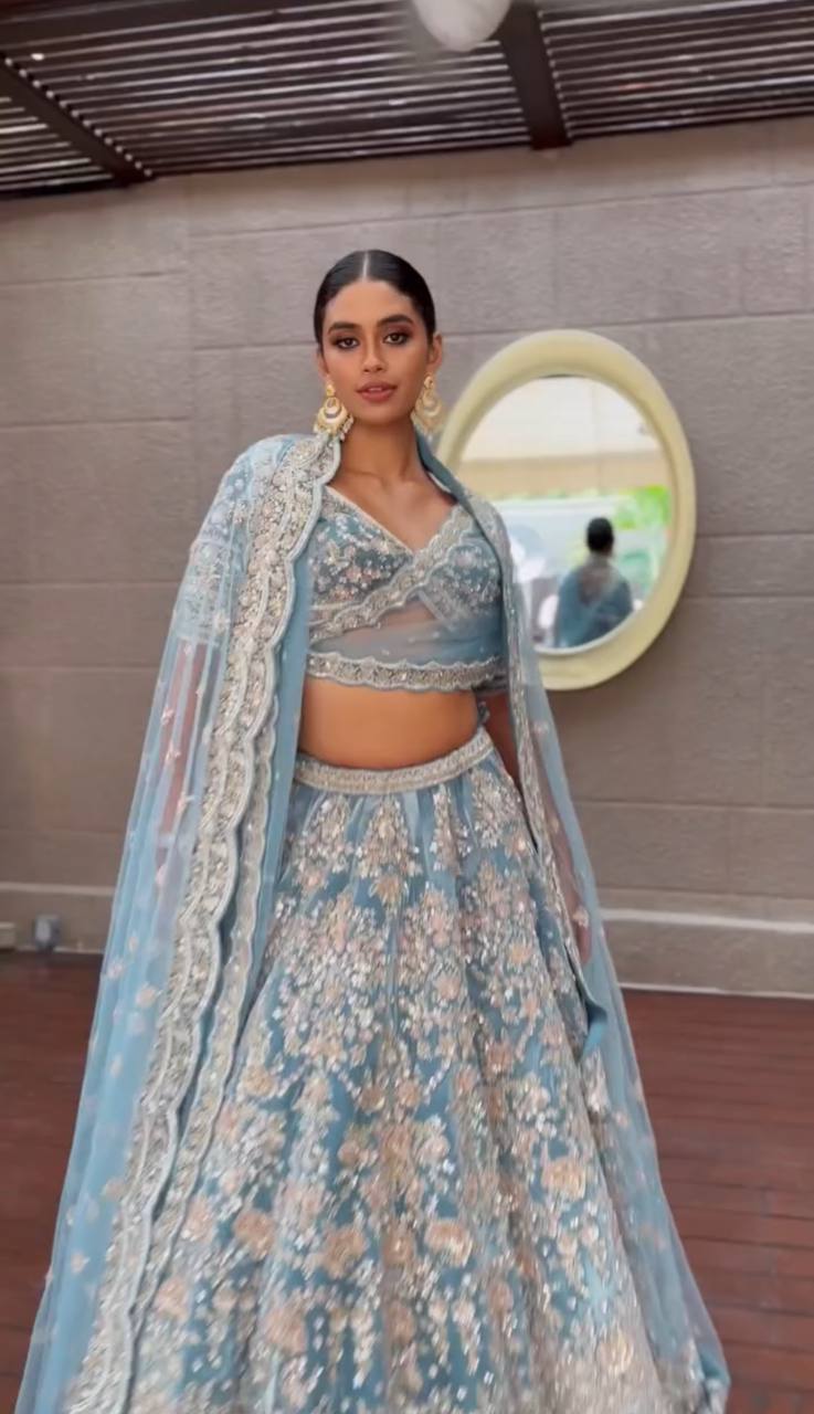 Powder Blue Heavy Embroidered Lehenga Set with Golden Zari and Sequin Work
