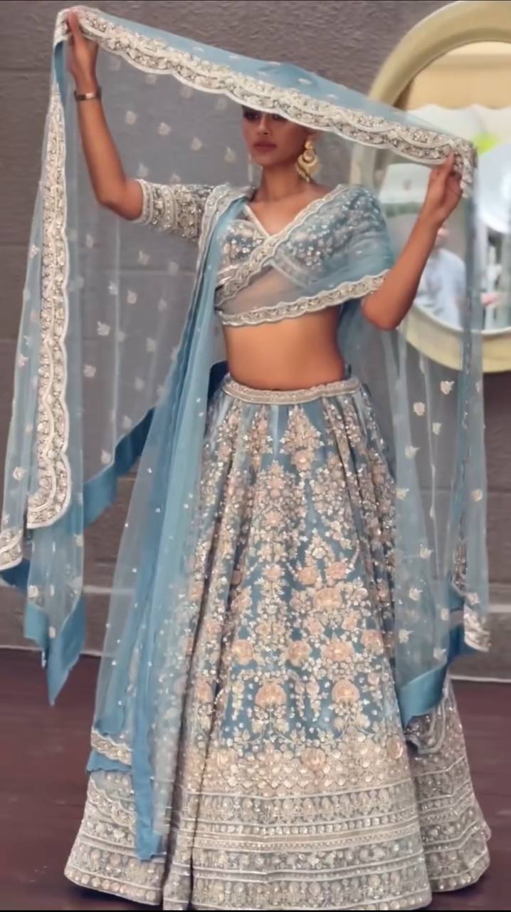 Powder Blue Heavy Embroidered Lehenga Set with Golden Zari and Sequin Work