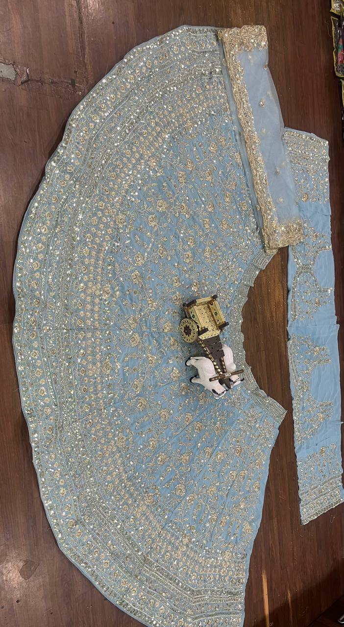 Powder Blue Heavy Embroidered Lehenga Set with Golden Zari and Sequin Work