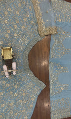 Powder Blue Heavy Embroidered Lehenga Set with Golden Zari and Sequin Work