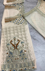 Ivory Gold Peacock Embroidered Net Lehenga Choli with Blue Accents