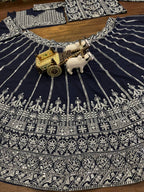 deep navy blue ensemble with intricate silver zari and thread embroidery