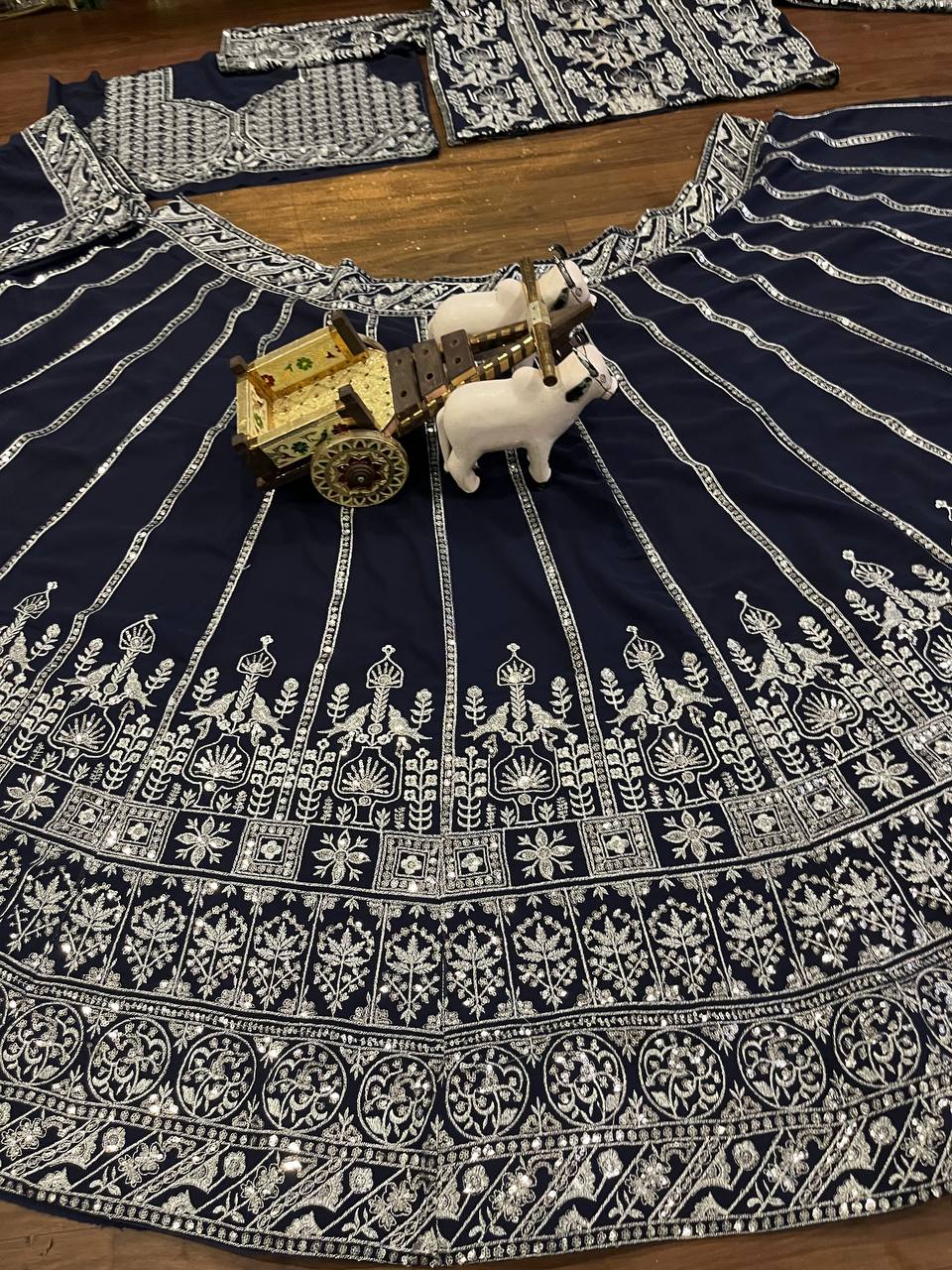 deep navy blue ensemble with intricate silver zari and thread embroidery