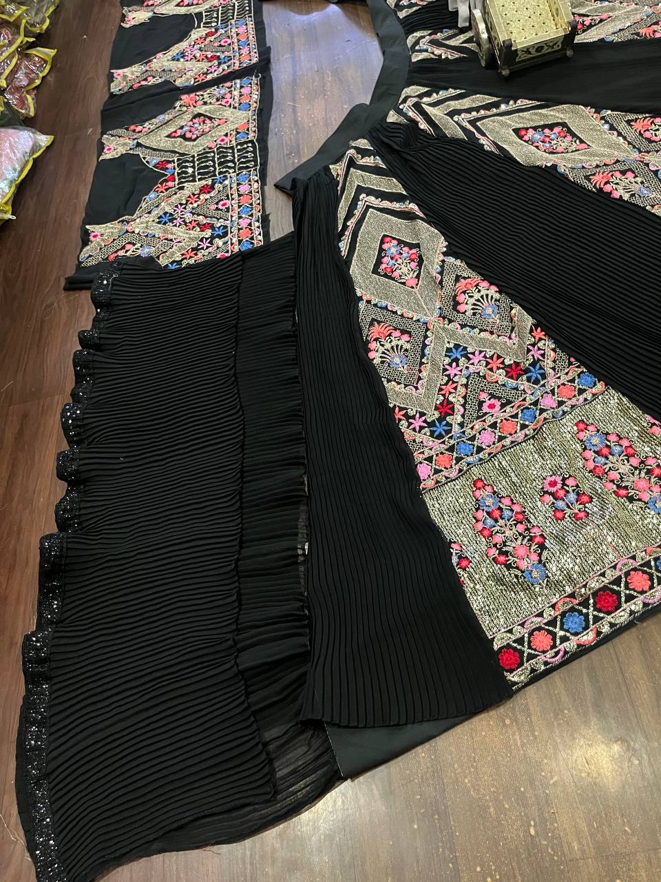 Multi colour black faux georgette lehenga with equins Embroidery Work  and designer blouse.