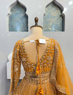 "Majestic Mustard Yellow Lehenga with Heavy Golden Zari & Sequins Embroidery – Bridal & Festive Wear"