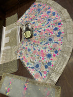 White Soft Net Lehenga Choli with Multicolor Embroidery & Sequin Accents