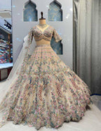 "Ivory White Embroidered Net Lehenga with Peacock & Floral Sequins Work – Bridal & Festive Wear"