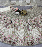 "Ivory White Embroidered Net Lehenga with Peacock & Floral Sequins Work – Bridal & Festive Wear"