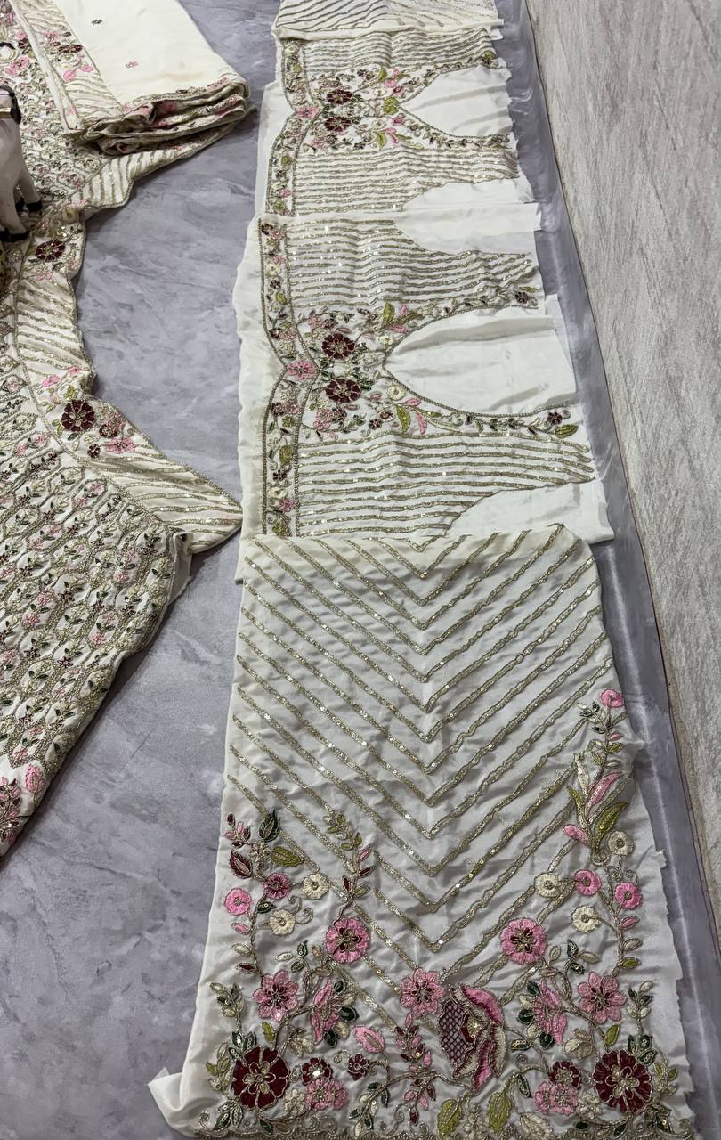 "Ivory White Embroidered Net Lehenga with Peacock & Floral Sequins Work – Bridal & Festive Wear"