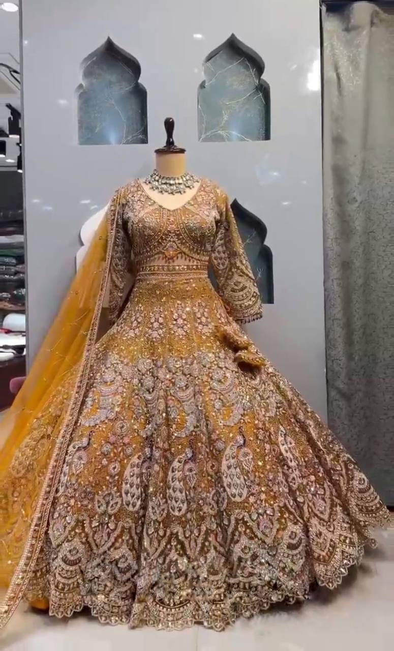 Royal Mustard Golden Peacock Embroidered Net Lehenga Choli