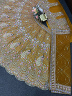 Royal Mustard Golden Peacock Embroidered Net Lehenga Choli
