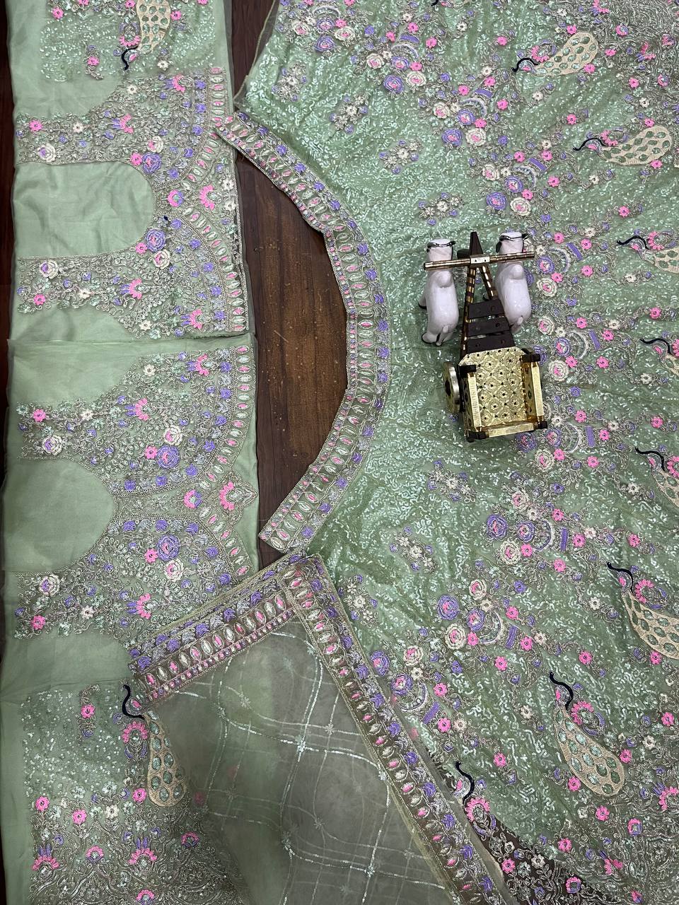 Mint Green Soft Net Lehenga Choli with Peacock and Multi-Thread Embroidery