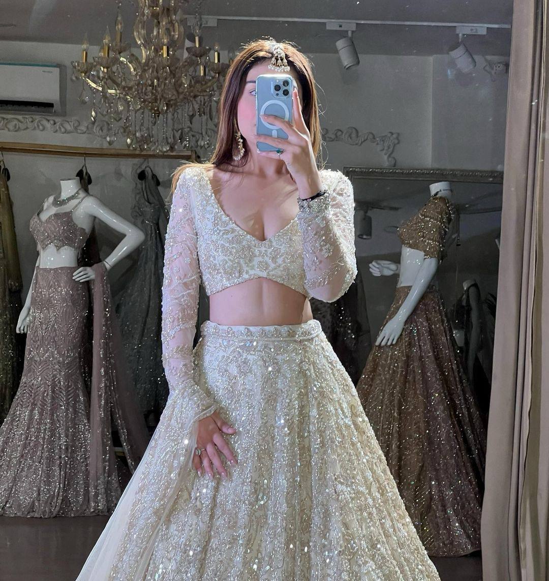 Ivory Grace Sequins & Thread Embroidered Lehenga Choli