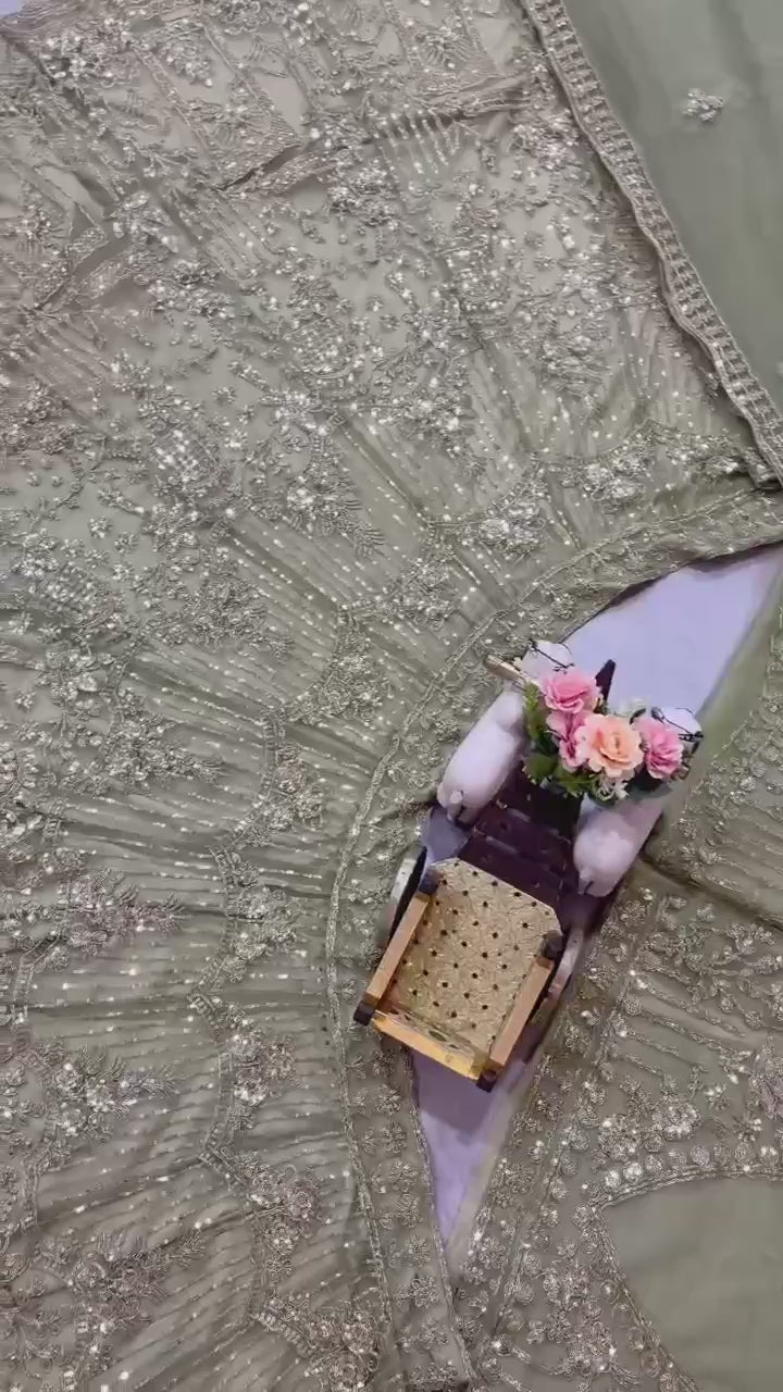 Olive Green Heavy Embroidered Net Lehenga Choli with Sequins & Zari Detailing